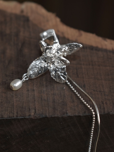 Silver wildflower ear clip with chain - single
