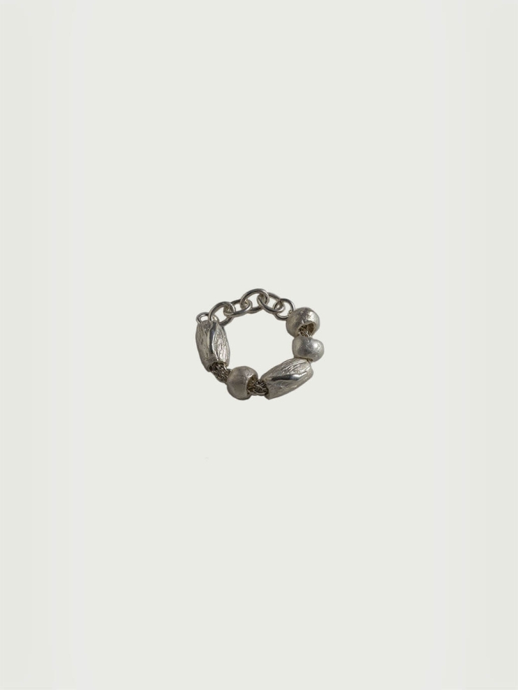 Silver water trace bead string ring