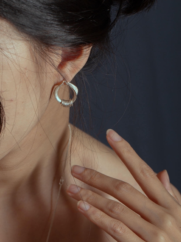 Silver orchid hoop earrings