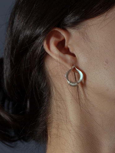 Silver orchid hoop earrings