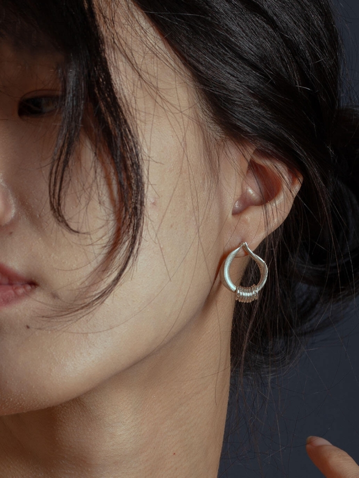Silver orchid hoop earrings