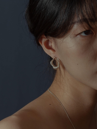 Silver orchid hoop earrings