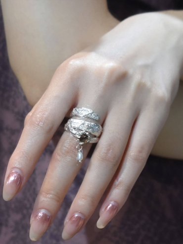 Silver spiral zircon ring