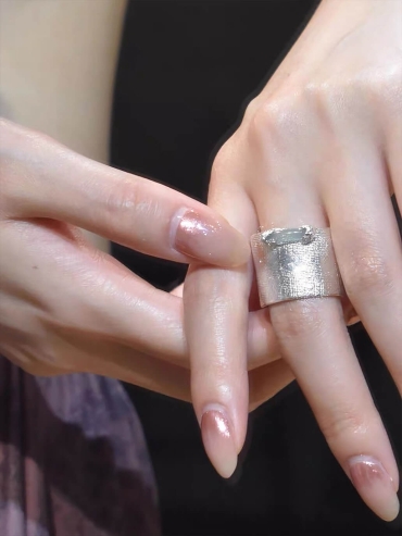 Silver thumb ring with jade