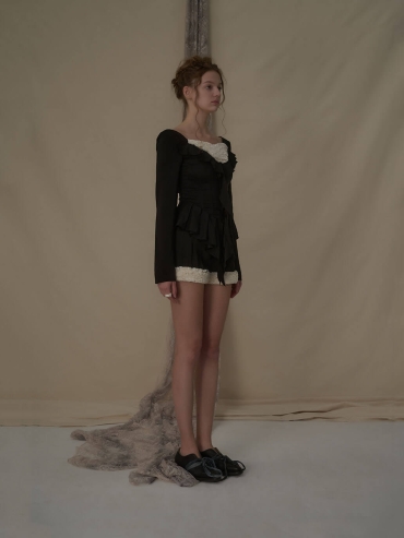 Lace-trimmed black and white color-blocked shorts