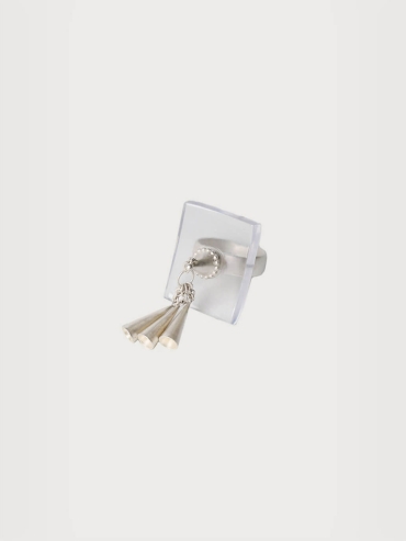White flowing bell ring