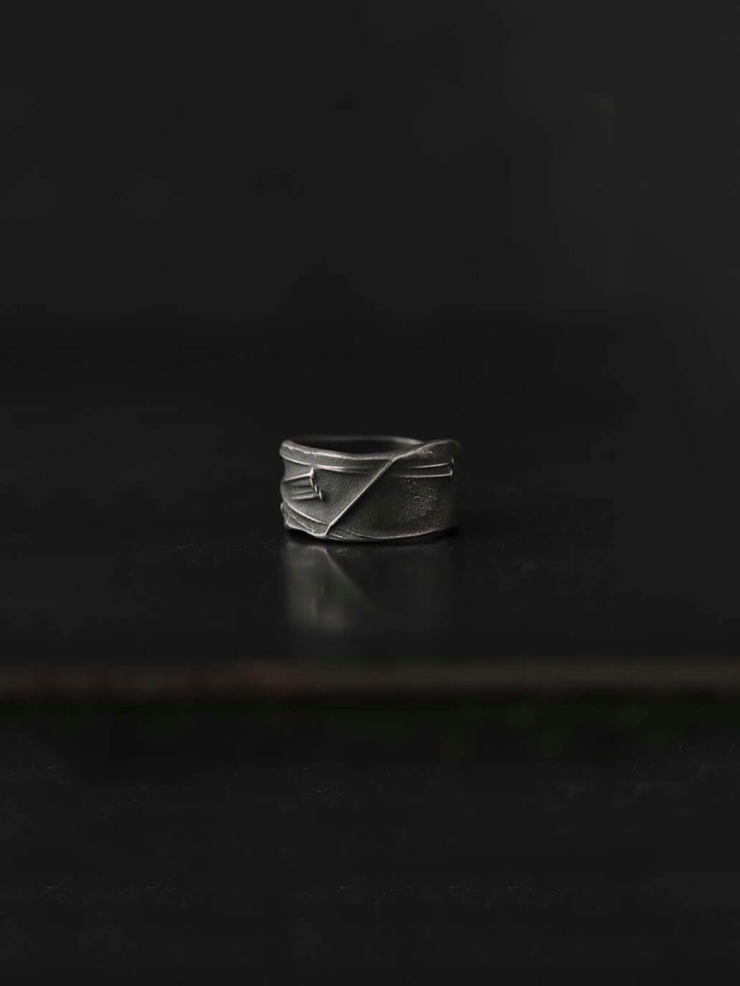 Black pin ring
