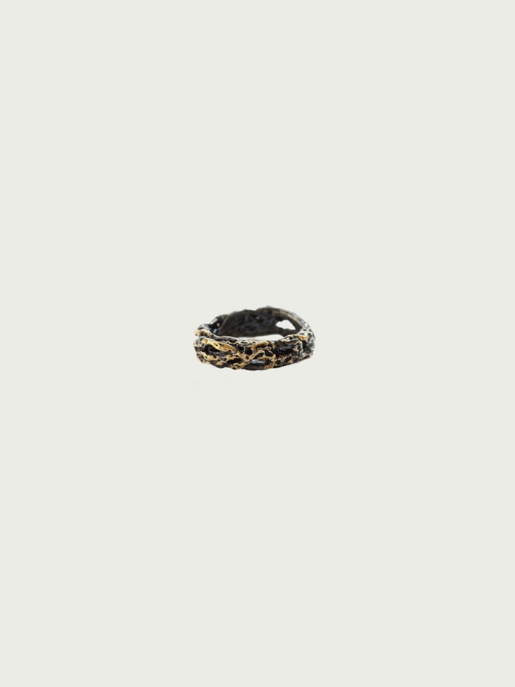 Black and gold riddle ring