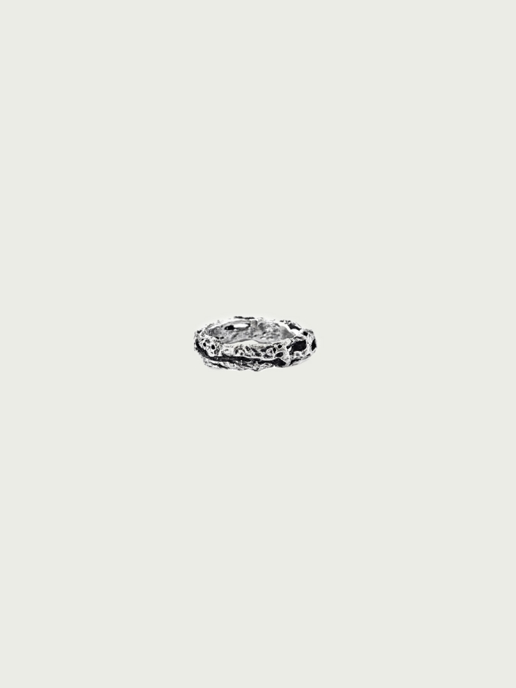 Black and silver riddle ring