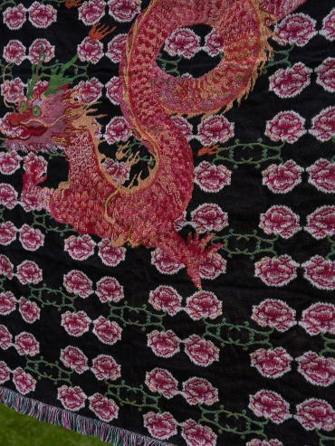 Black and pink coiling dragon and peony blanket