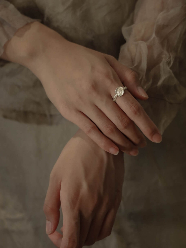 Silver carved round ring