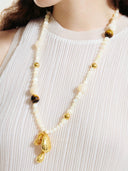 prestashop:1:2176:16747 | Amber and white flower shrub necklace