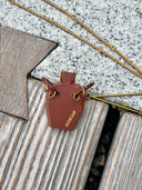 prestashop:1:4437:21587 | Vintage-Style Handcrafted Leather Vase Sculpture Pendant