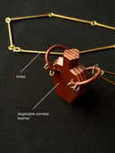 prestashop:1:4437:25548 | Vintage-Style Handcrafted Leather Vase Sculpture Pendant