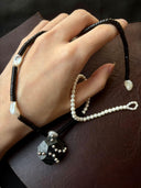 prestashop:1:4438:21637 | Black & White Faceted Leather Silver Bead Pearl Necklace