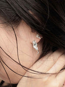 prestashop:1:5285:25592 | The Fluent Arc White Tear Earrings