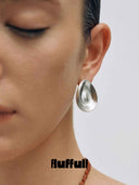 prestashop:1:5650:27798 | Silver Eggshell Texture Earrings