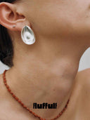 prestashop:1:5650:27799 | Silver Eggshell Texture Earrings
