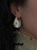 prestashop:1:5650:27800 | Silver Eggshell Texture Earrings